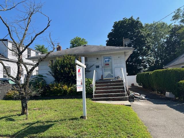 87 W Clinton Avenue, Roosevelt, NY 11575
