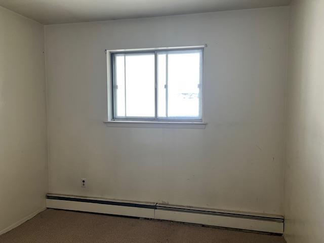 87 W Clinton Avenue, Roosevelt, NY 11575