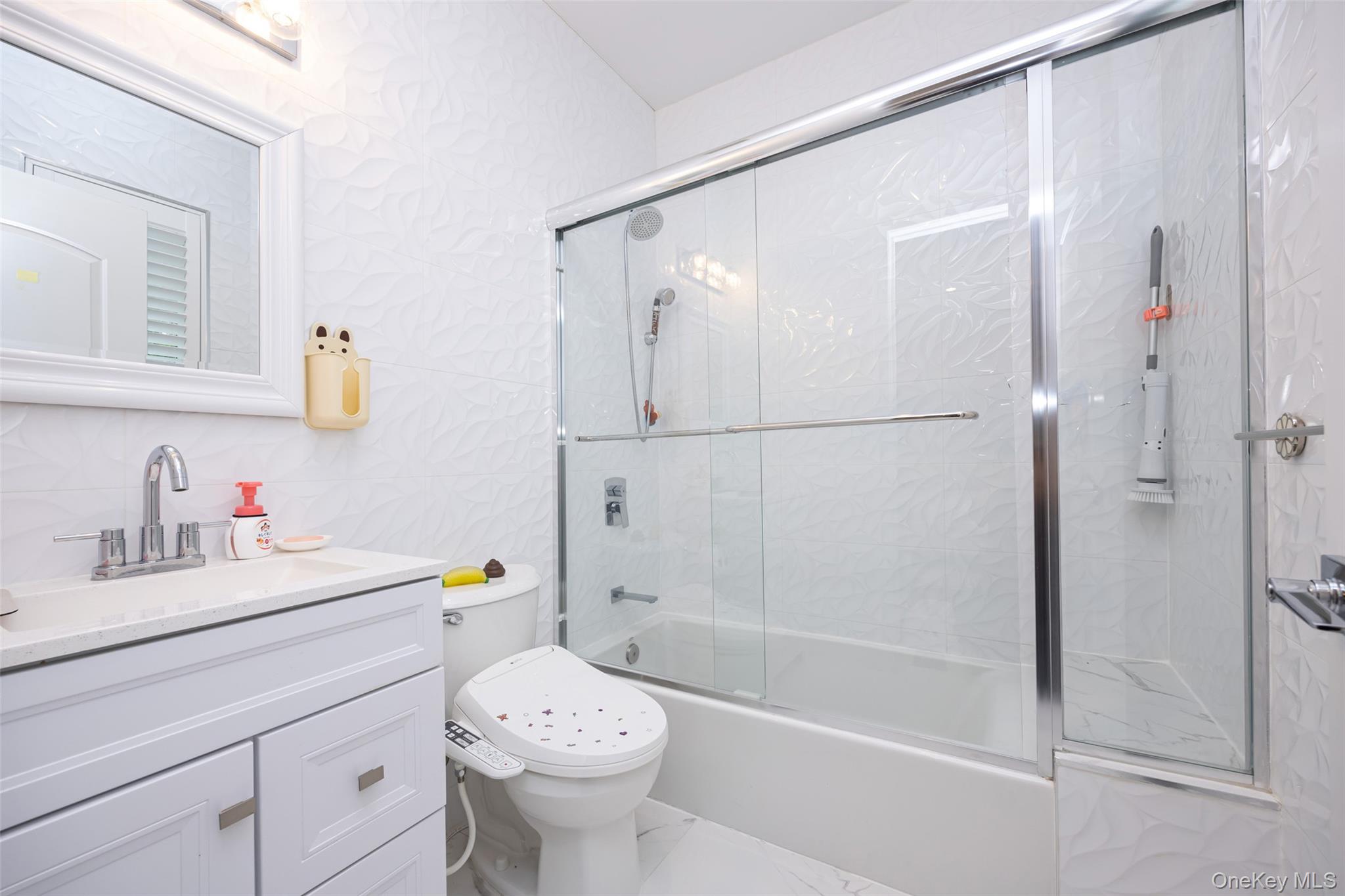 90 Baker Hill Road, Great Neck, NY 11023