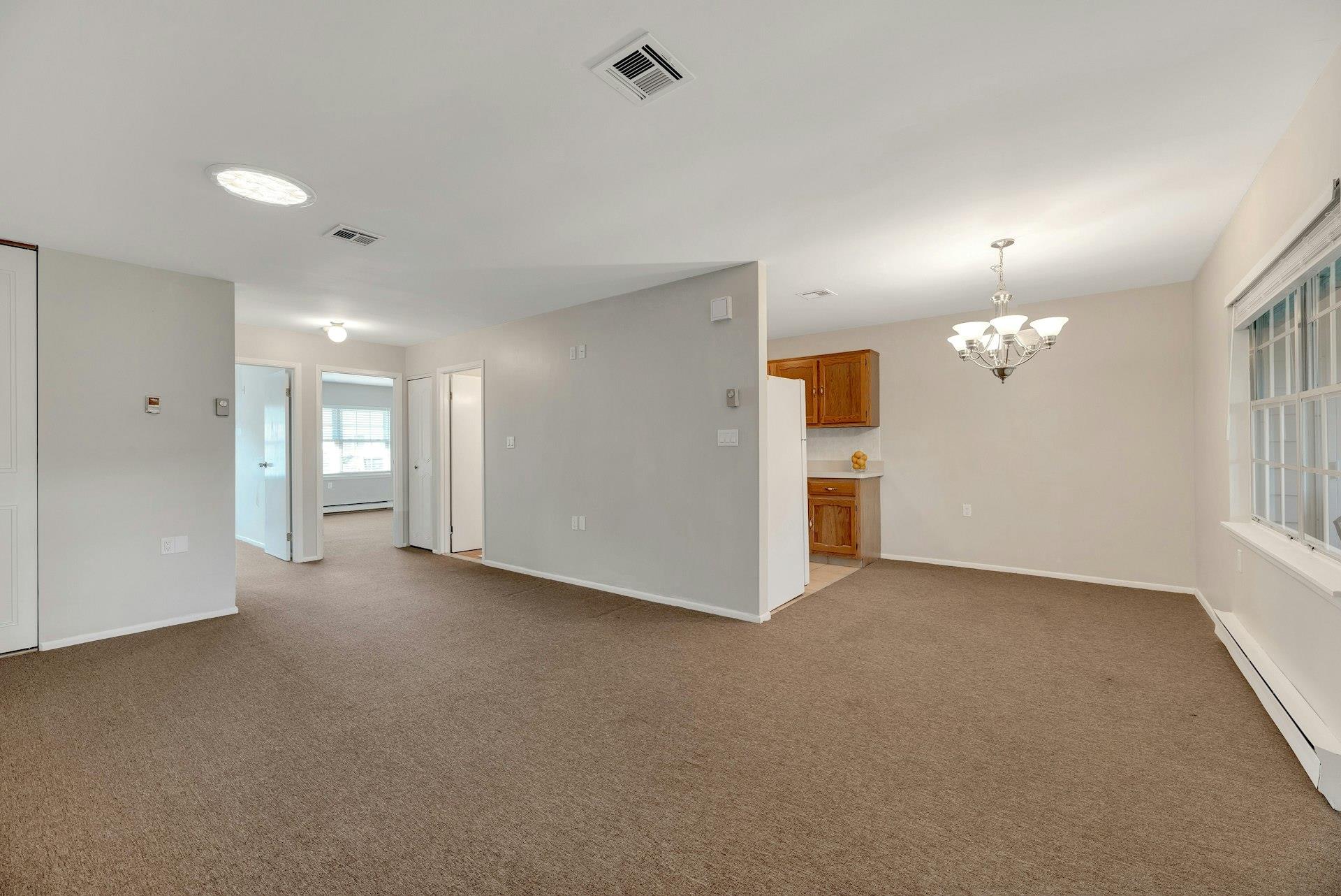 164 Falmouth Court # E, Ridge, NY 11961