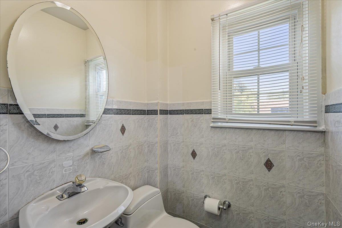 8702 188th Street, Jamaica Estates, NY 11423