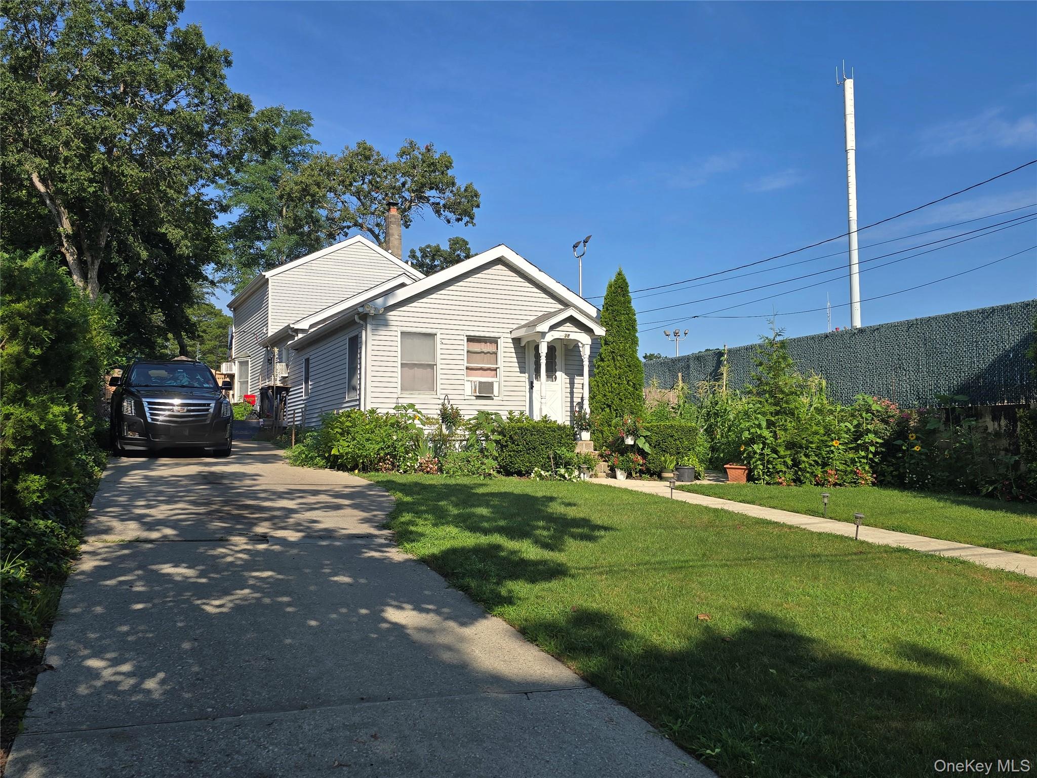 38 Woodmont Place, Farmingville, NY 11738