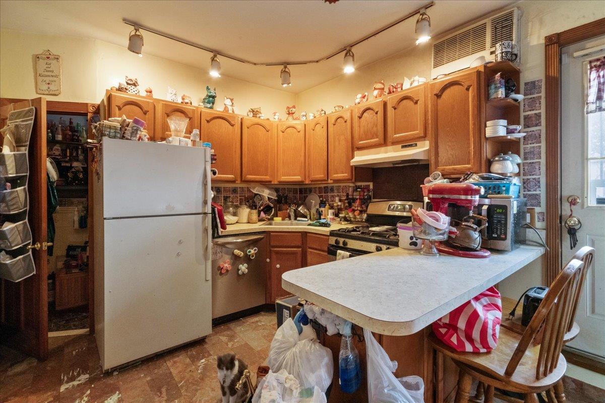 97-25 102nd Street, Ozone Park, NY 11416