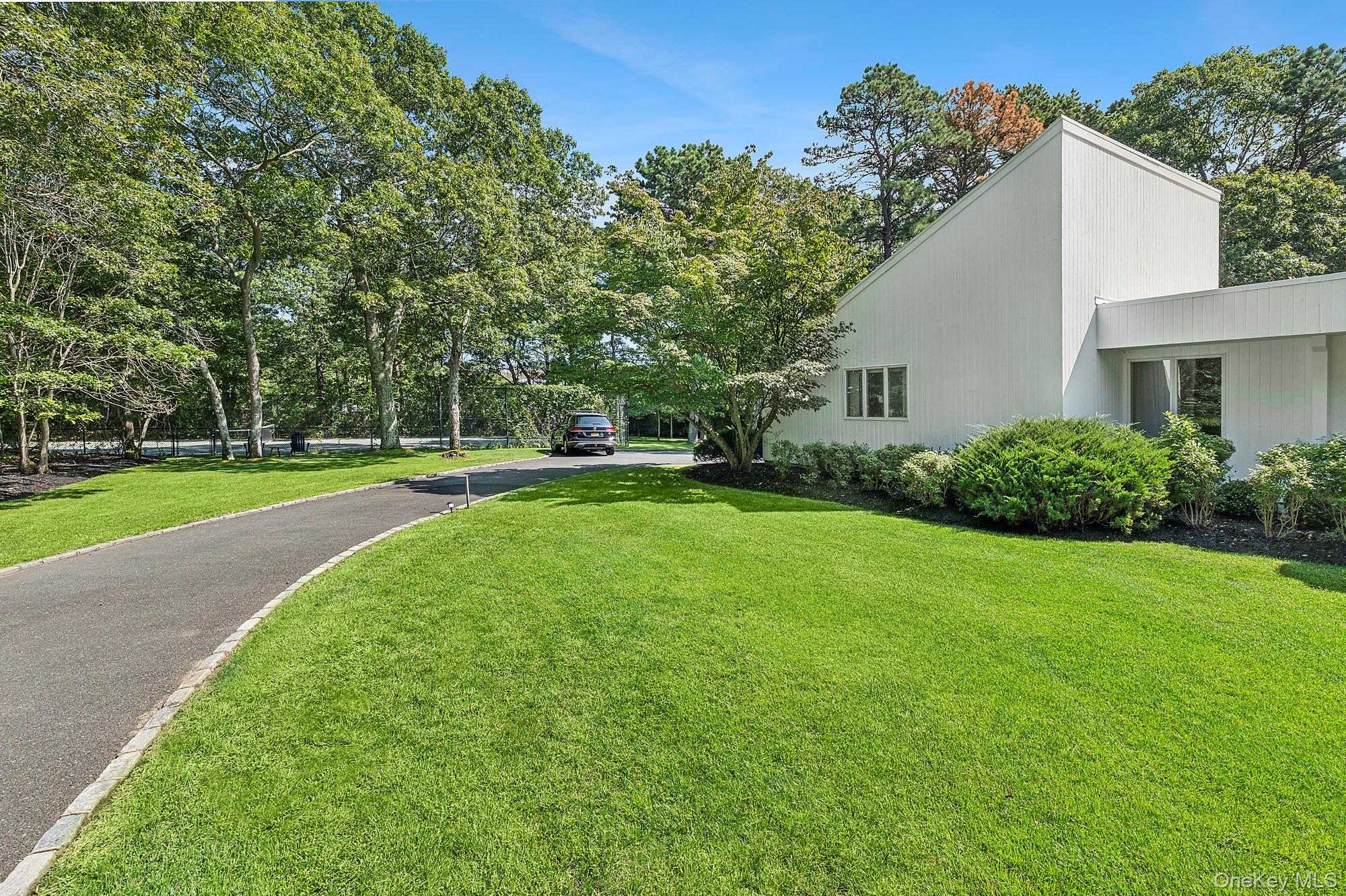 12 Honeysuckle Lane, East Quogue, NY 11942