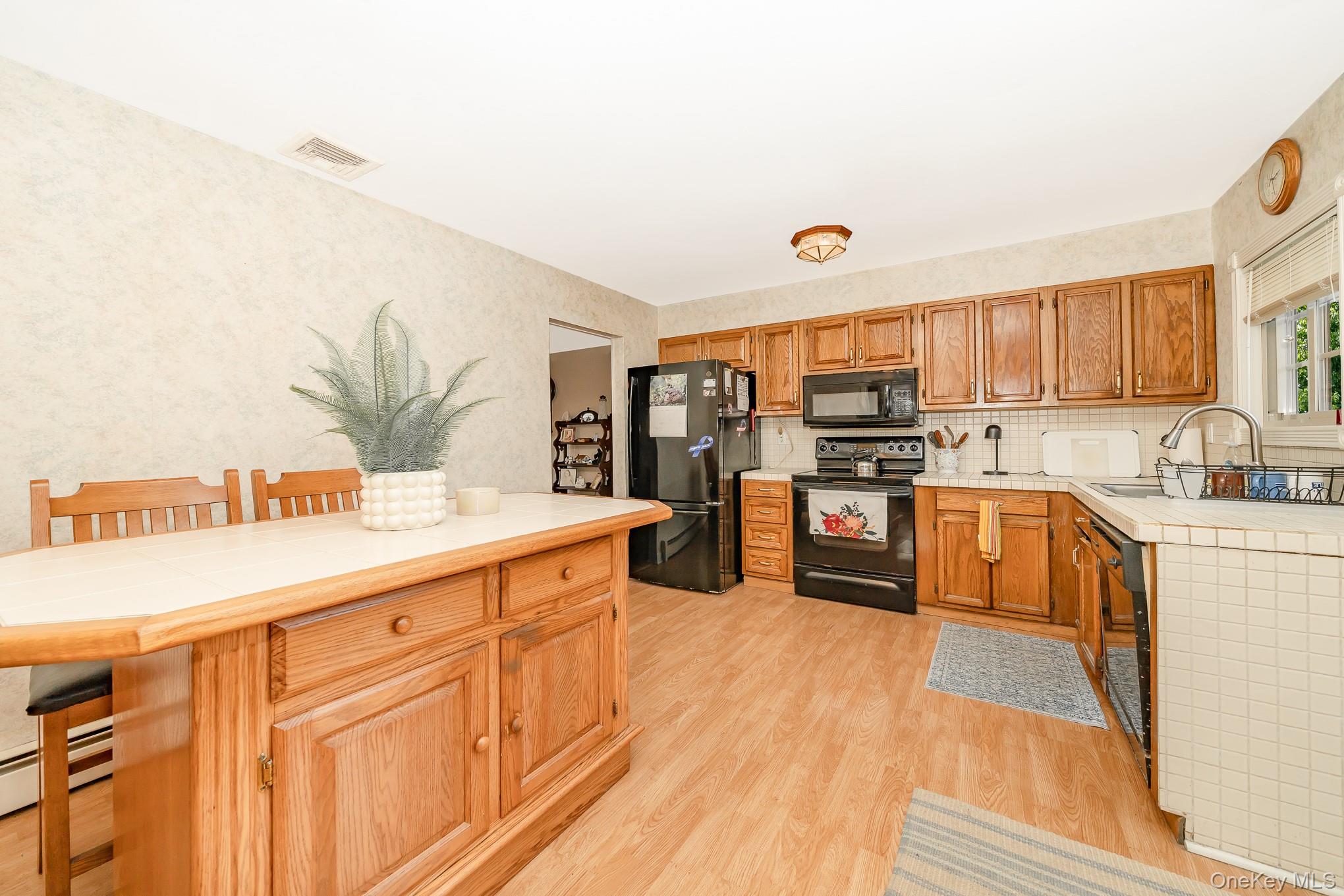 16 Malcolm Street, Bellport, NY 11713