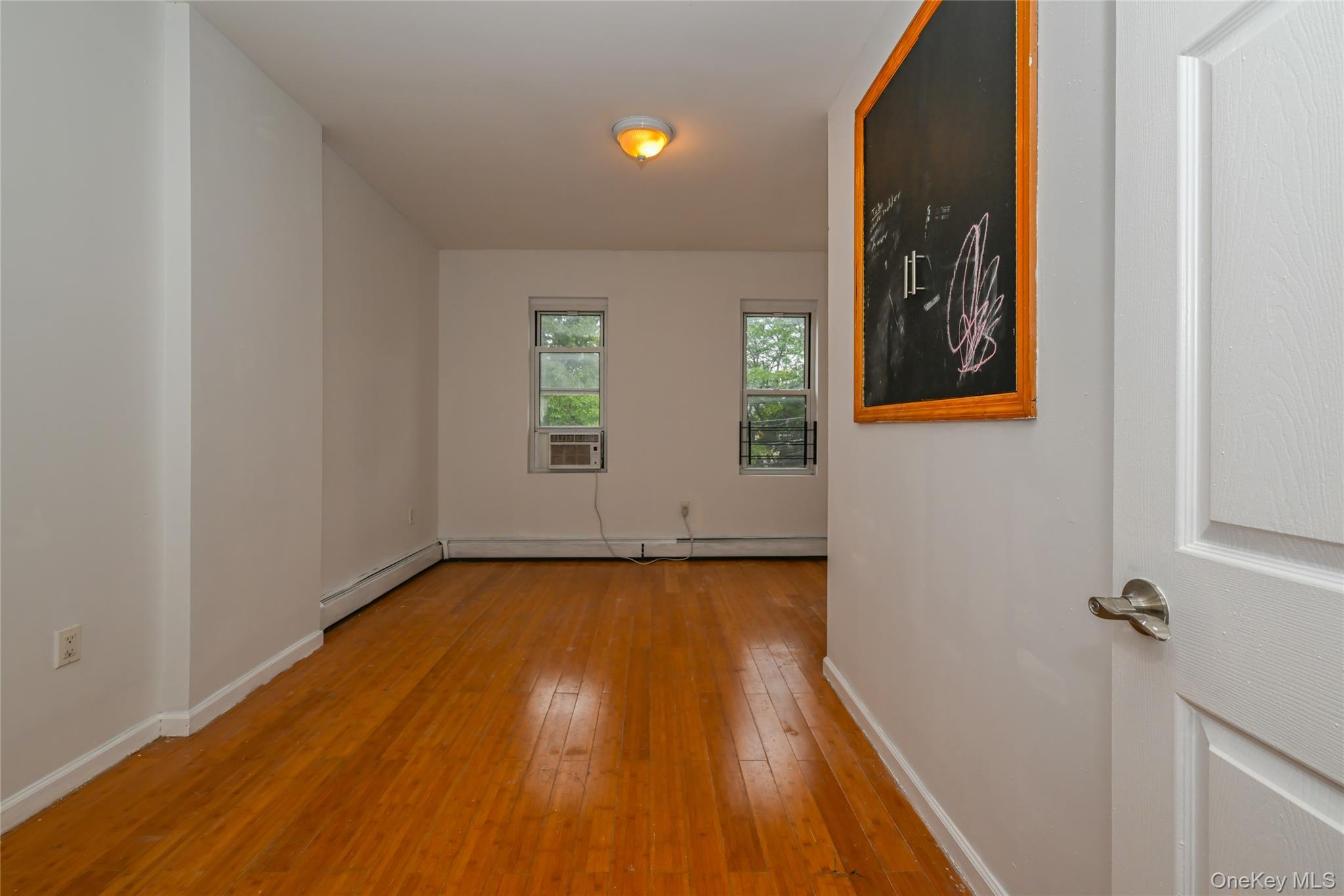 44-11/13 66 Street, Woodside, NY 11377