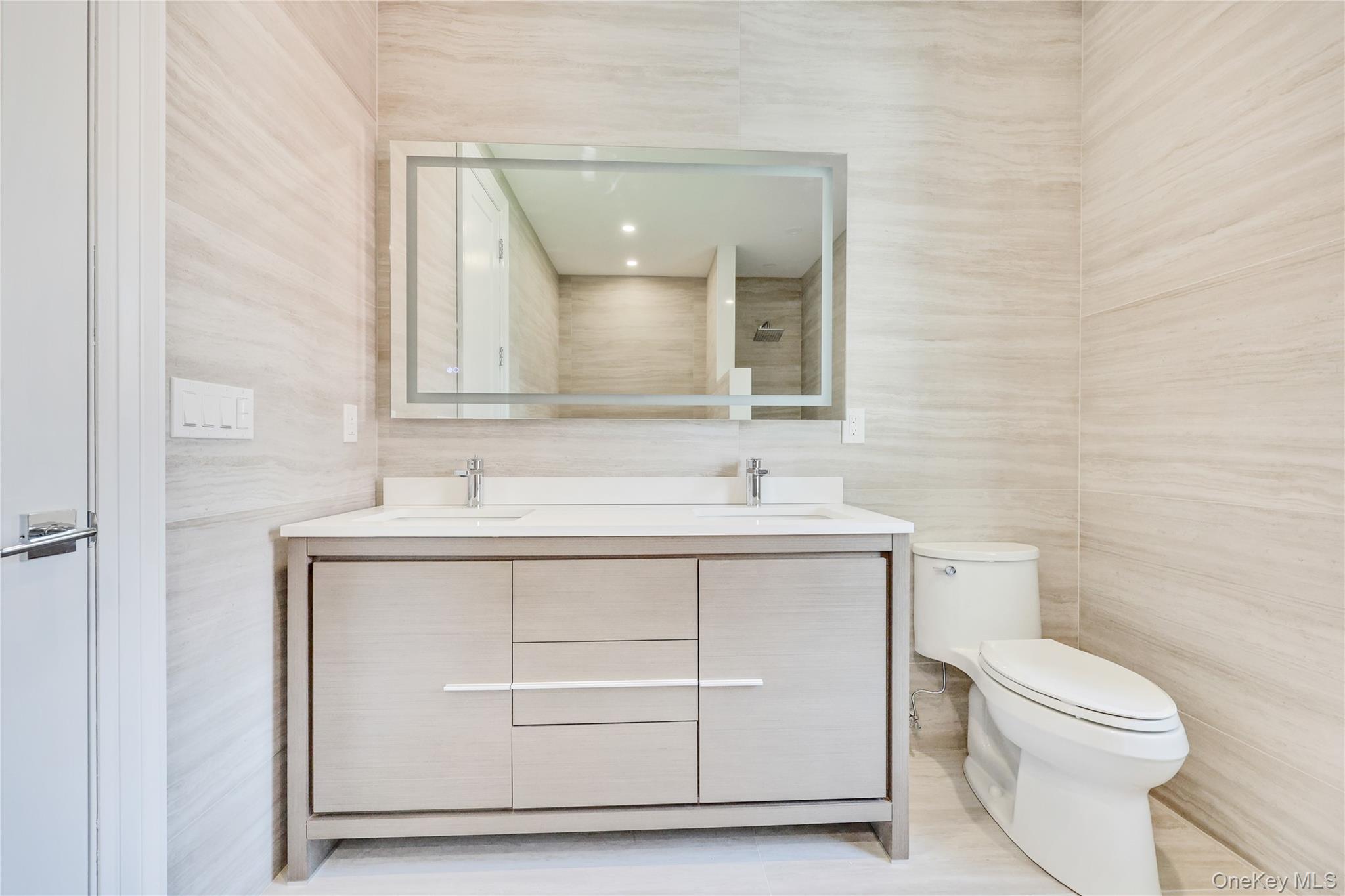 8 Sealy Drive, Lawrence, NY 11559