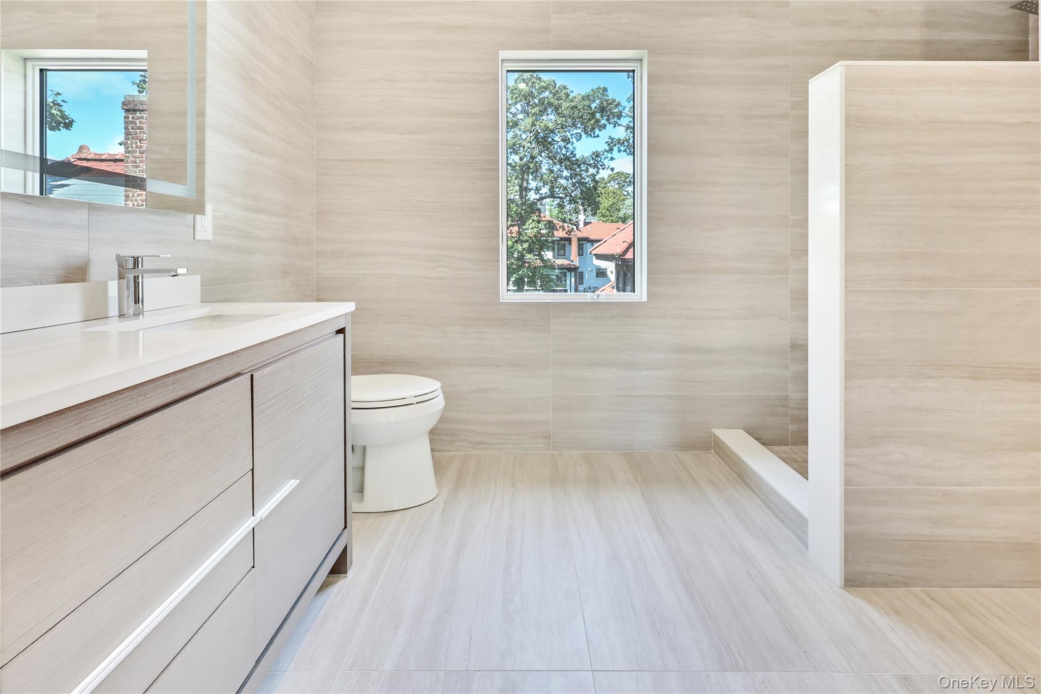 8 Sealy Drive, Lawrence, NY 11559