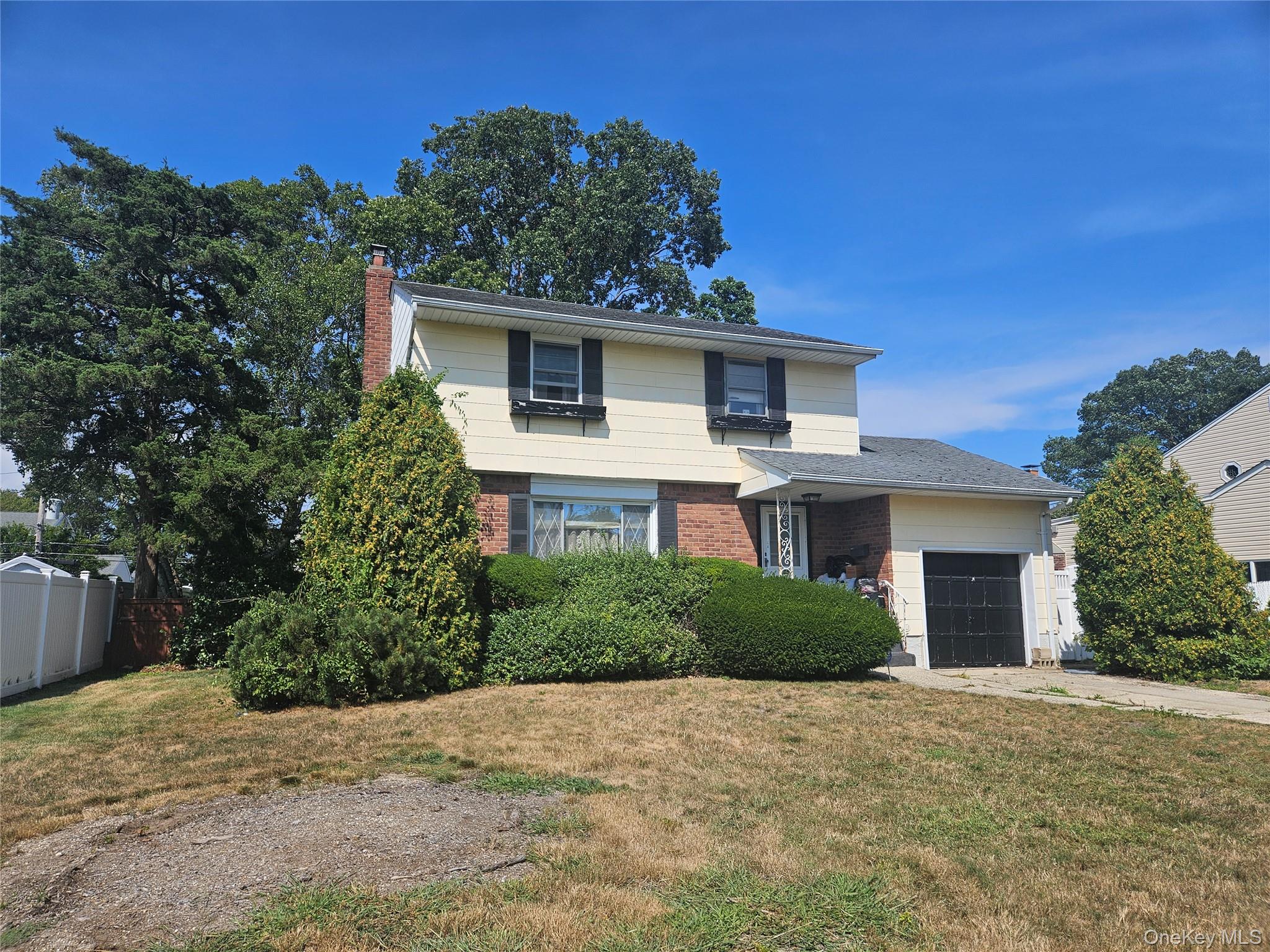 165 Country Village Lane, East Islip, NY 11730