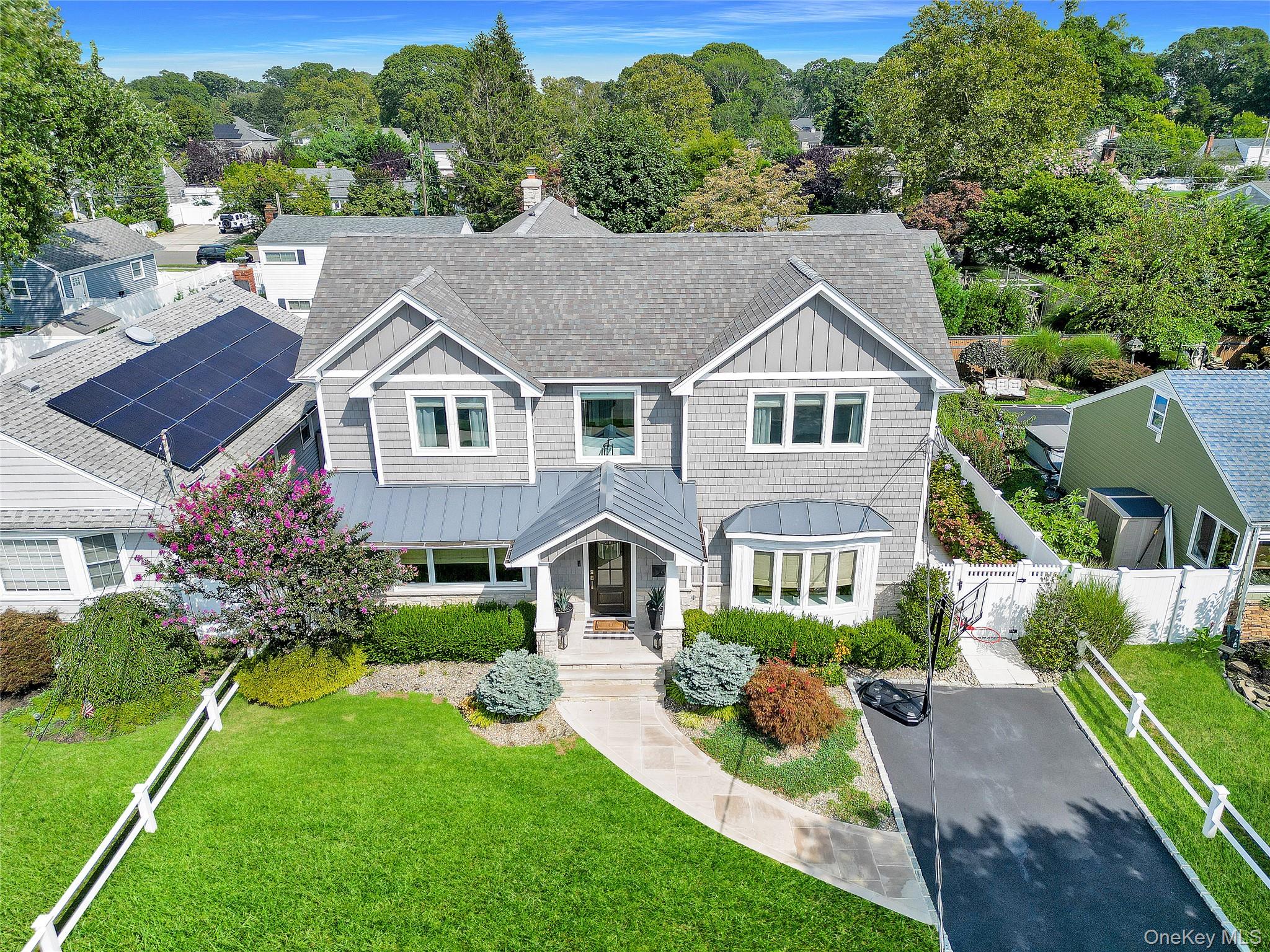 86 Unqua Road, Massapequa, NY 11758