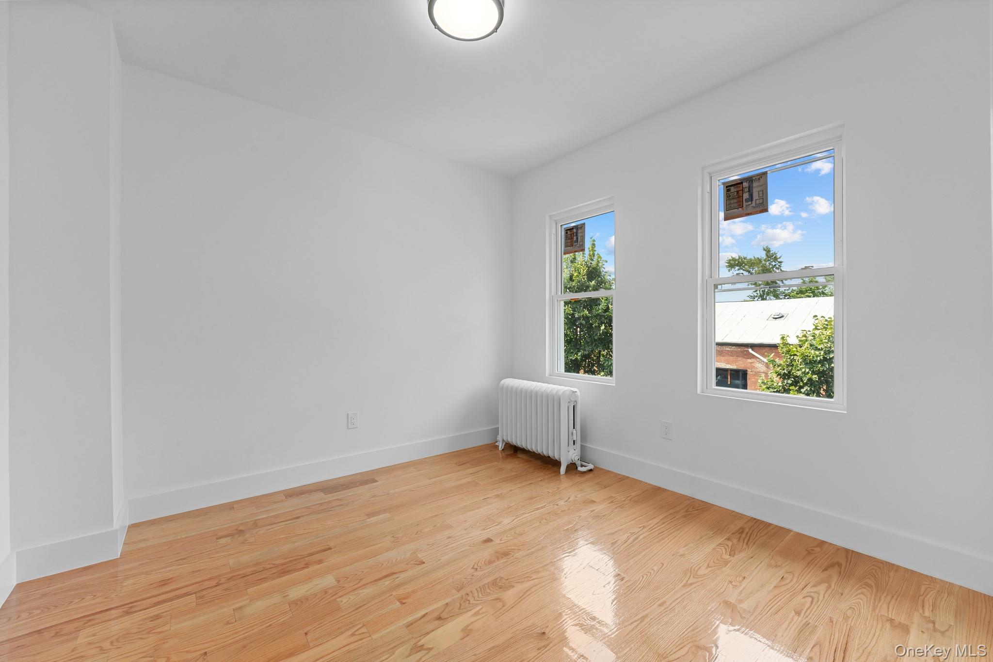 8771 123rd Street, Richmond Hill, NY 11418