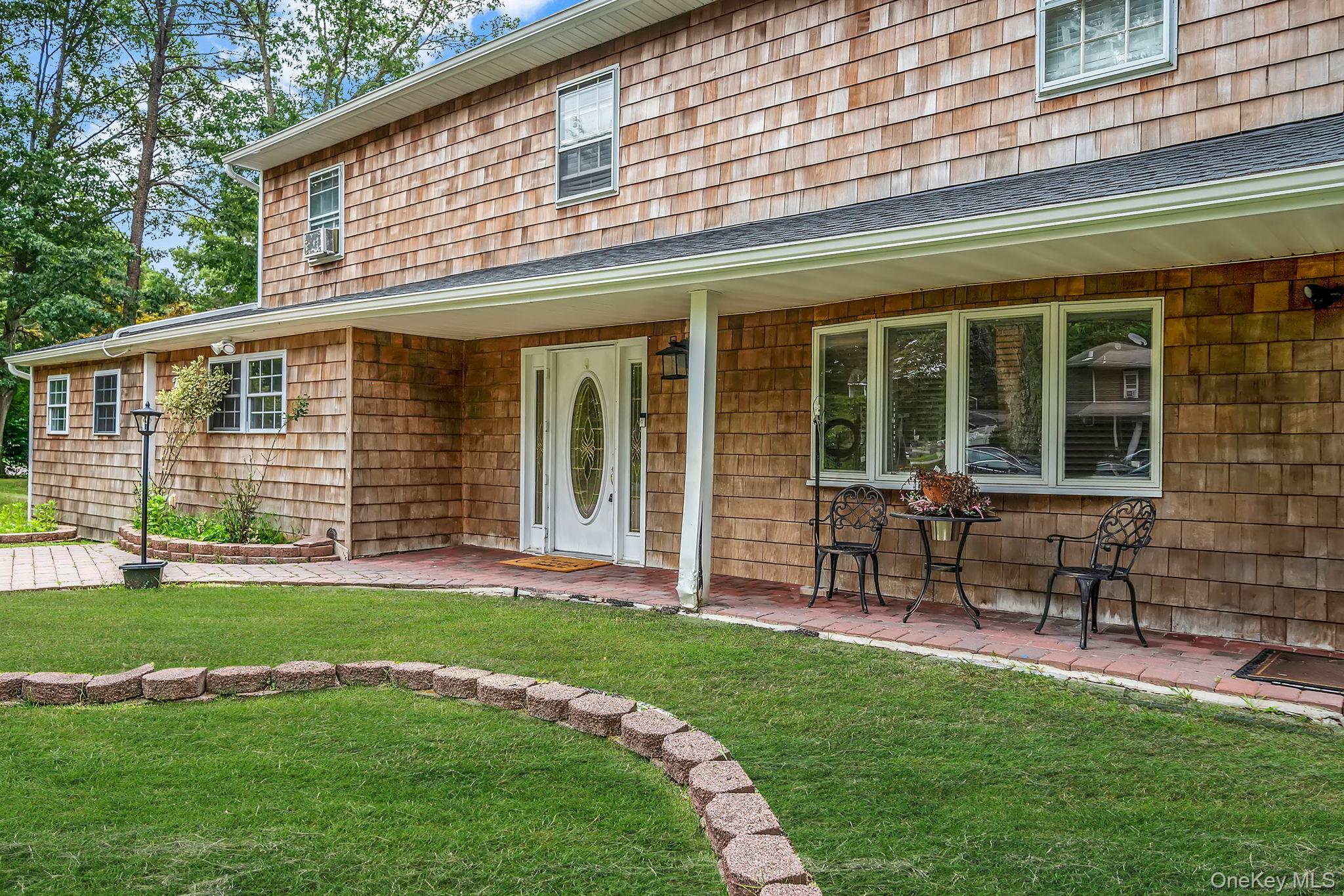 32 Artist Lake Boulevard, Middle Island, NY 11953