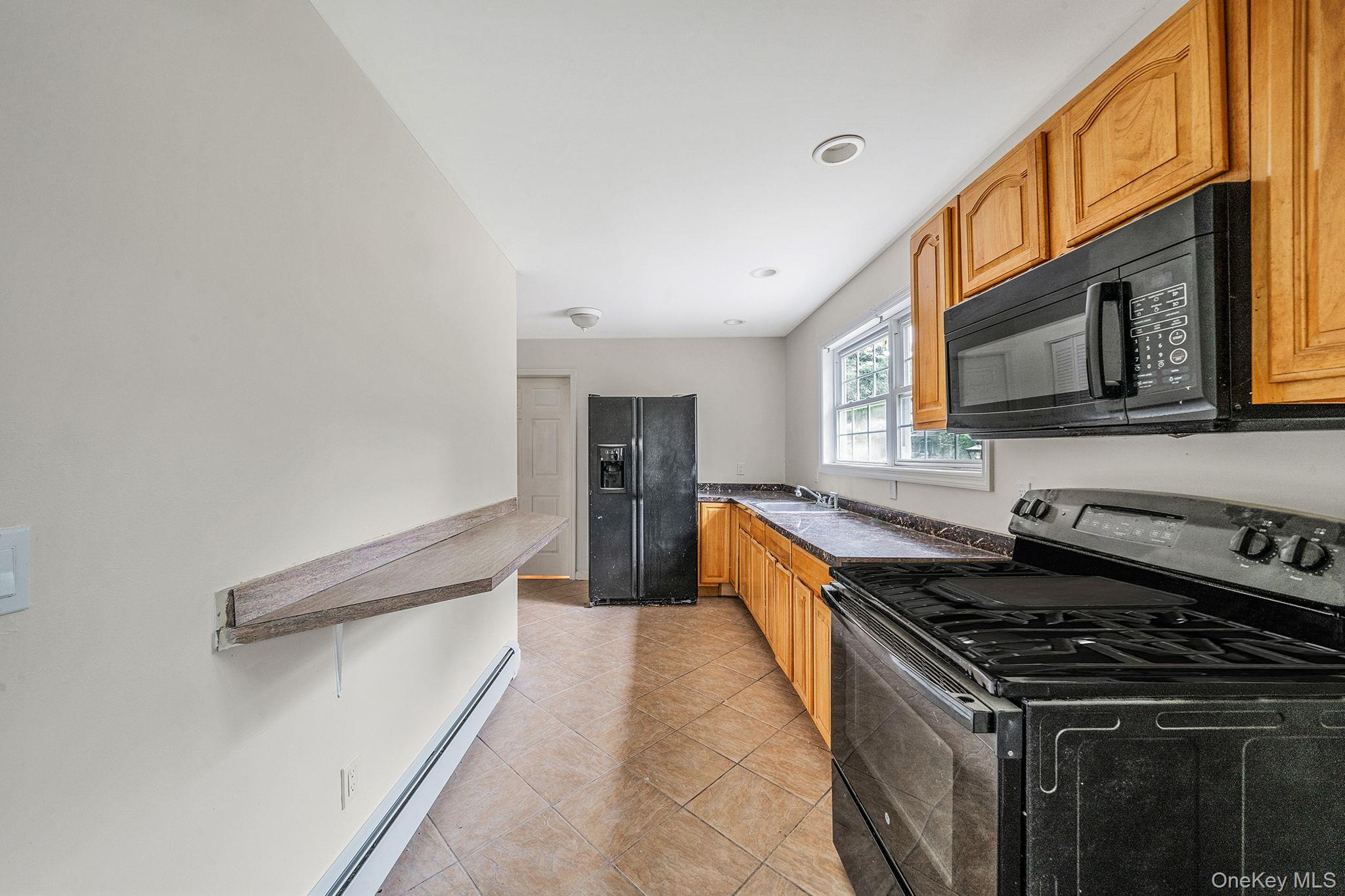 32 Artist Lake Boulevard, Middle Island, NY 11953