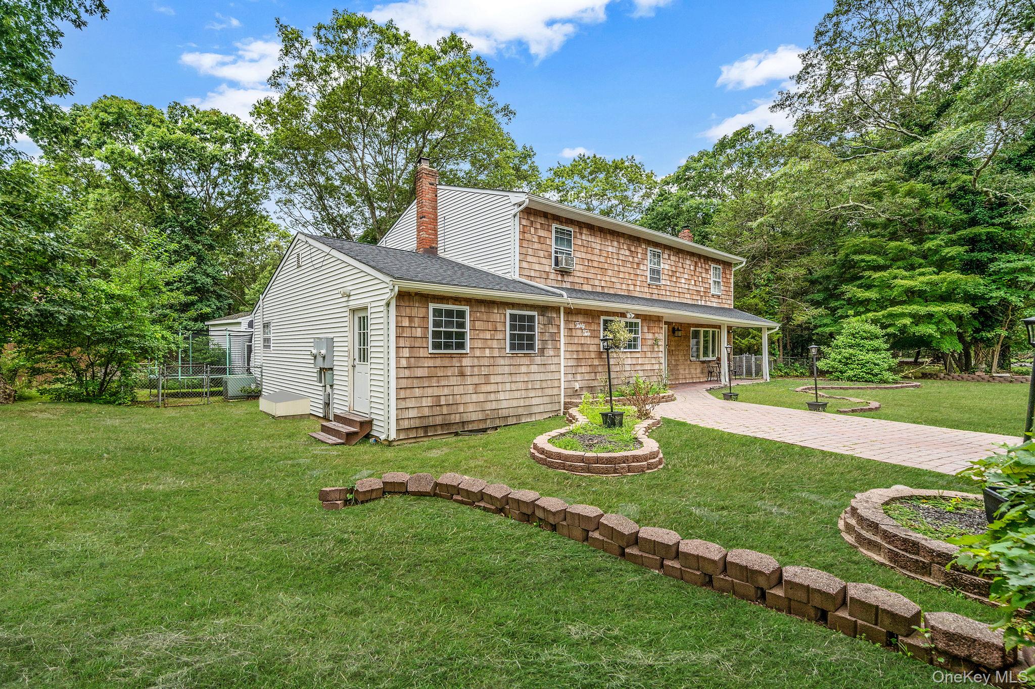 32 Artist Lake Boulevard, Middle Island, NY 11953