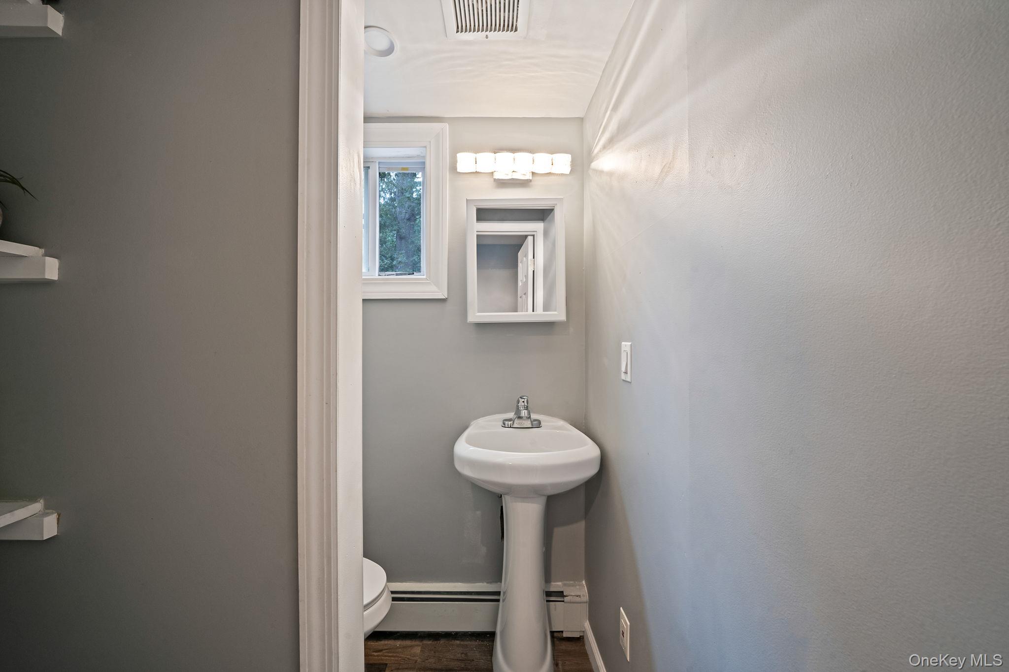 32 Artist Lake Boulevard, Middle Island, NY 11953