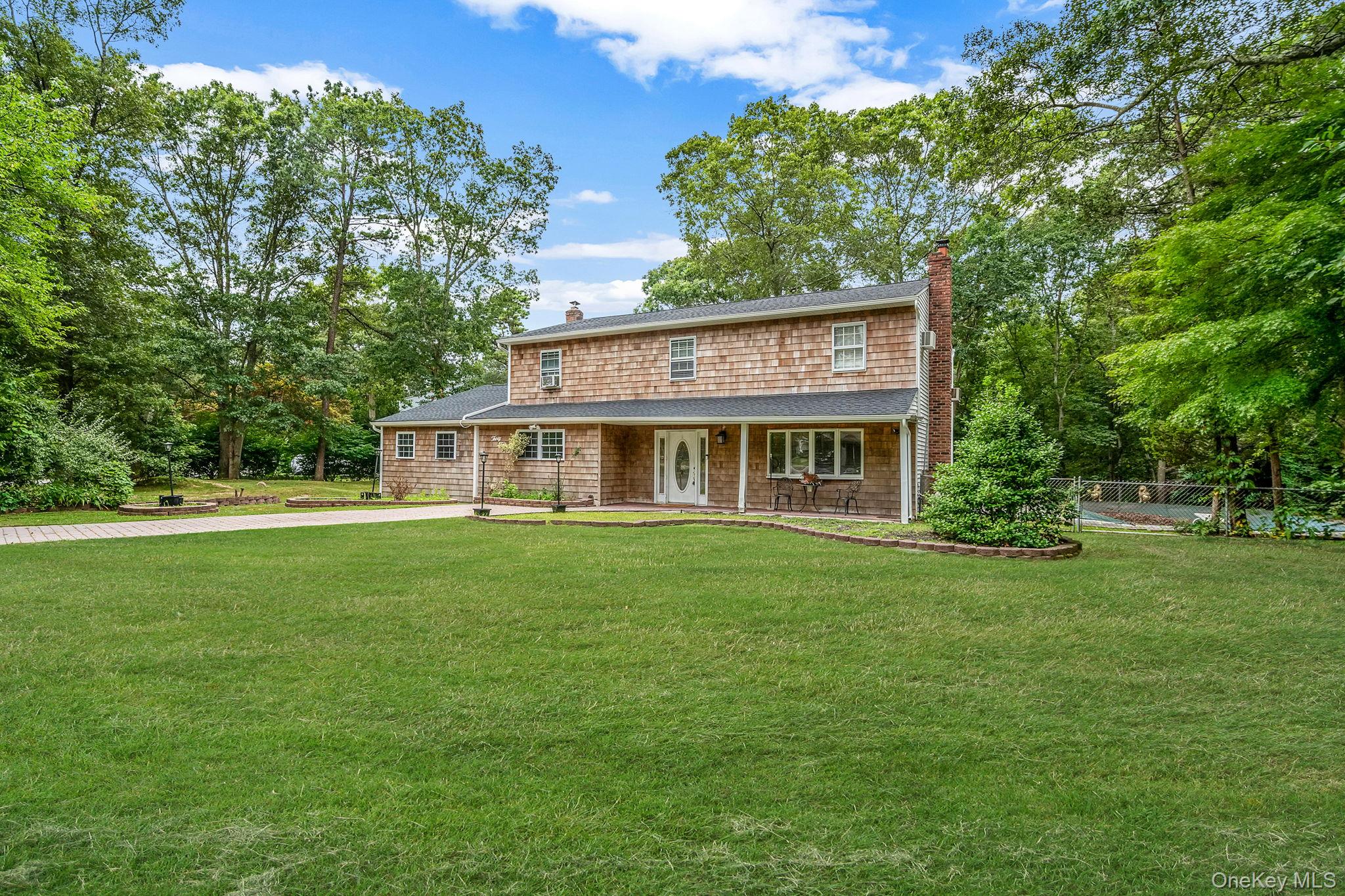 32 Artist Lake Boulevard, Middle Island, NY 11953