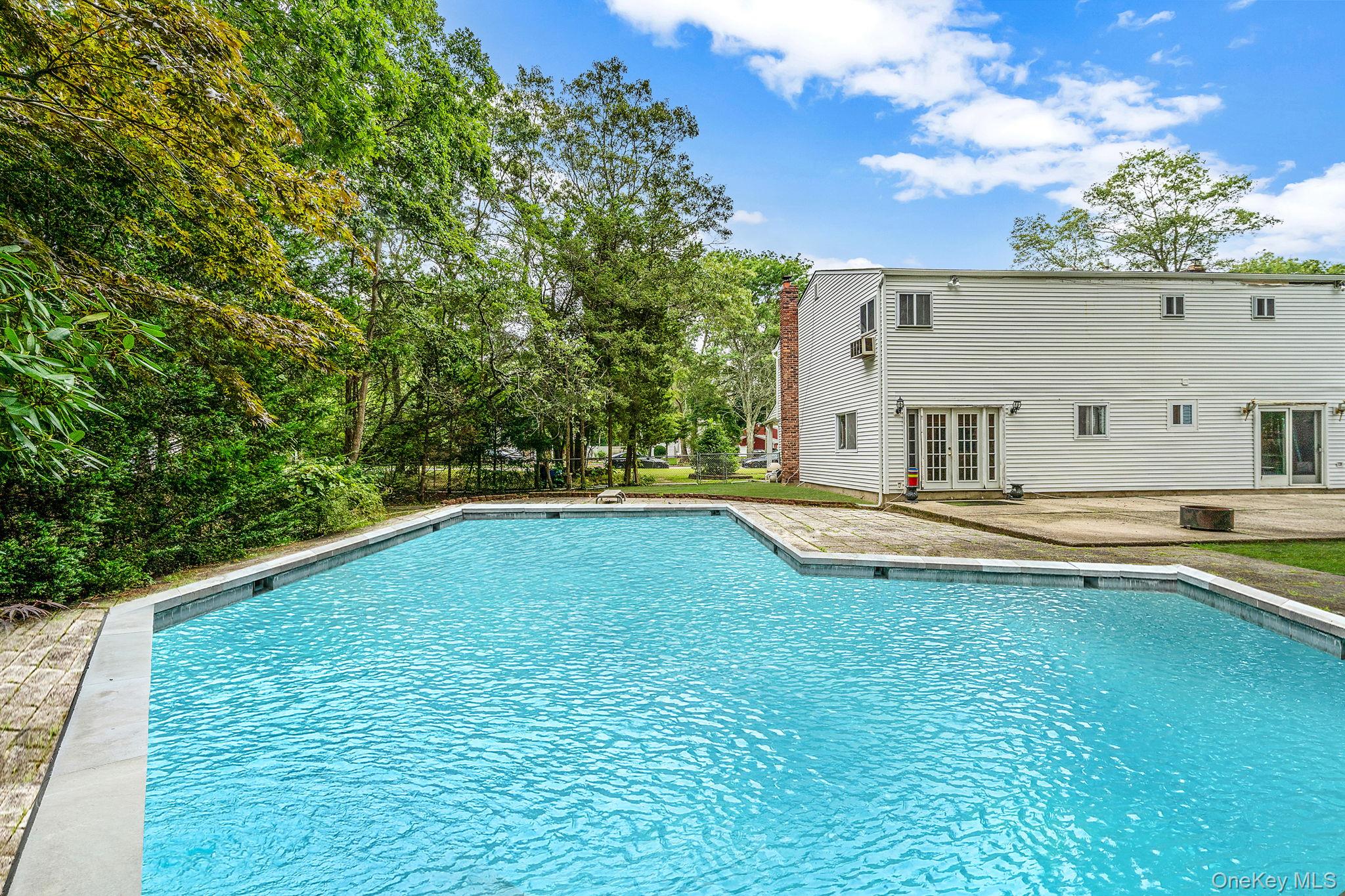 32 Artist Lake Boulevard, Middle Island, NY 11953