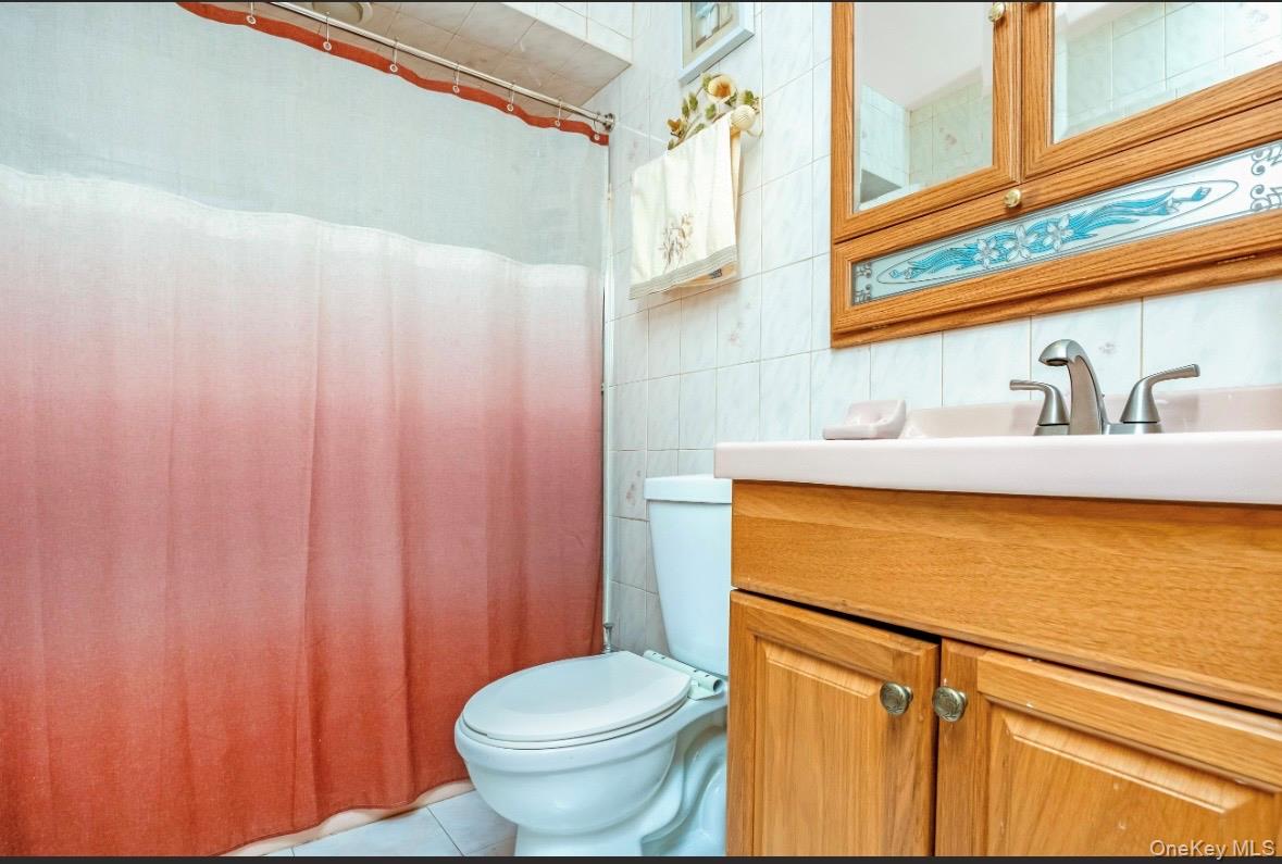 6983 Juniper Boulevard S, Middle Village, NY 11379