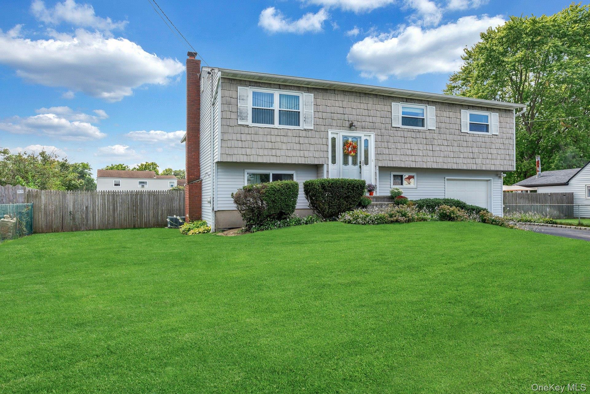 14 Holiday Park Drive, Centereach, NY 11720