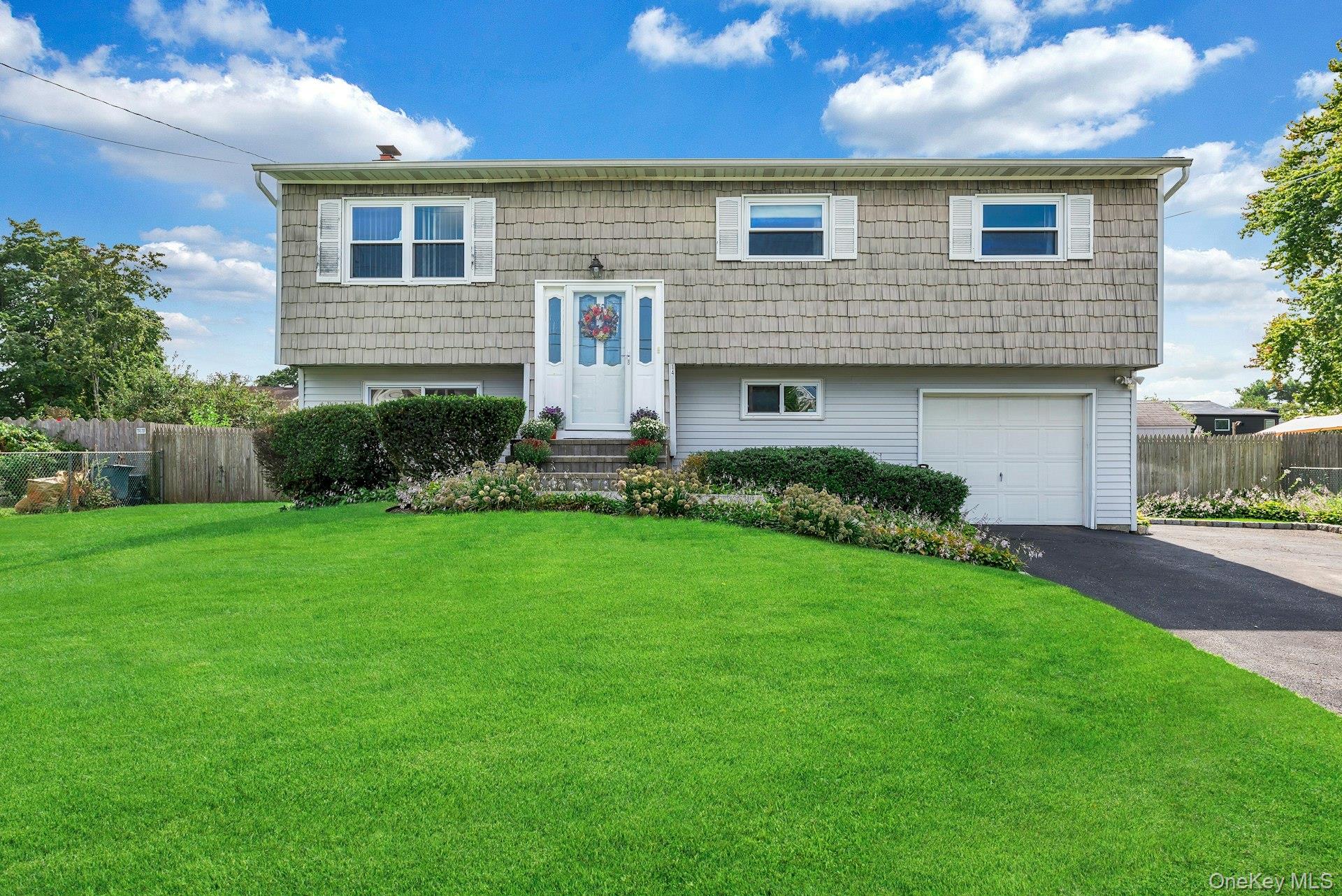 14 Holiday Park Drive, Centereach, NY 11720