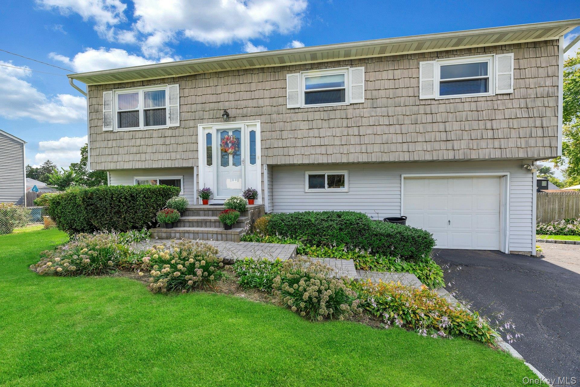 14 Holiday Park Drive, Centereach, NY 11720