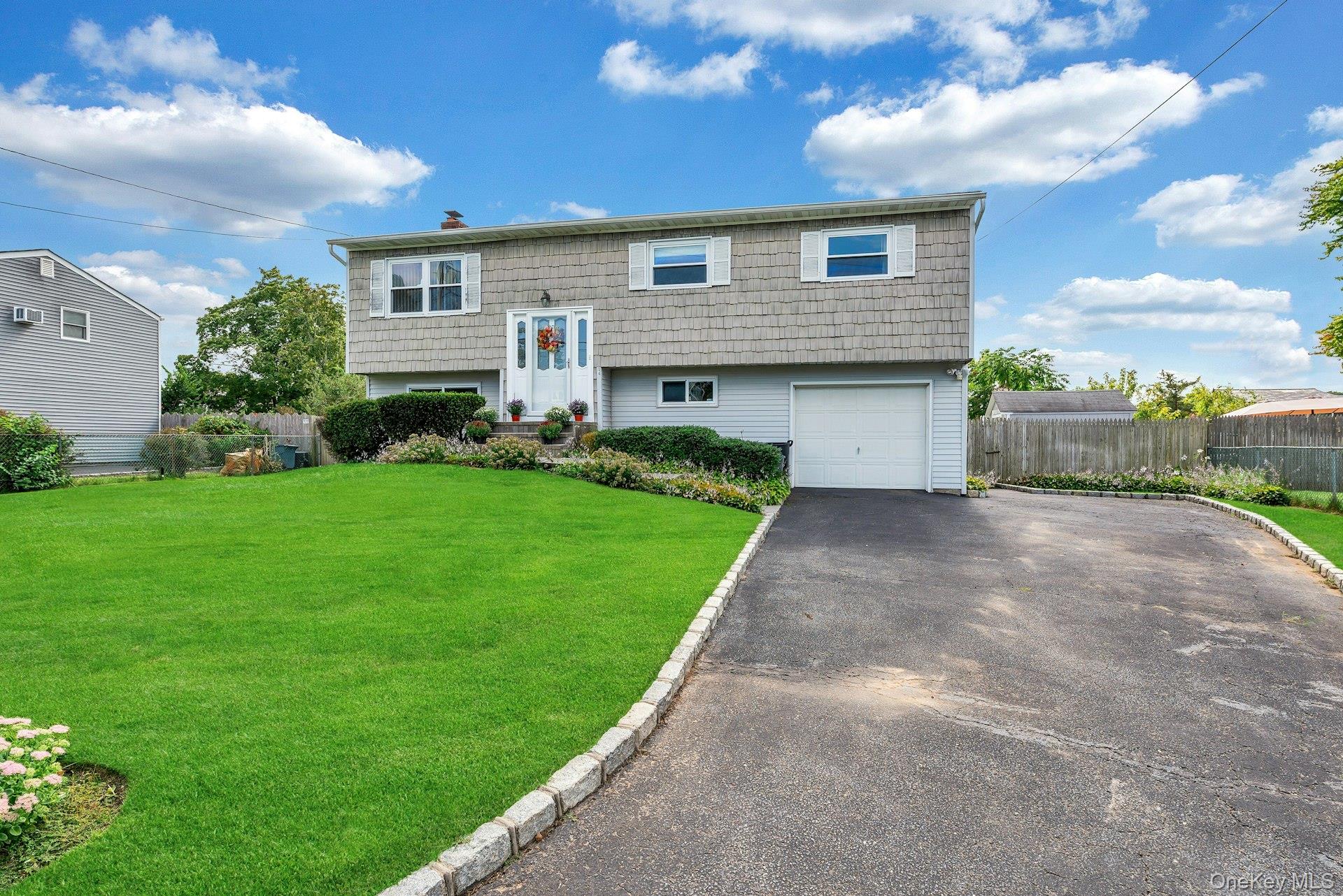 14 Holiday Park Drive, Centereach, NY 11720