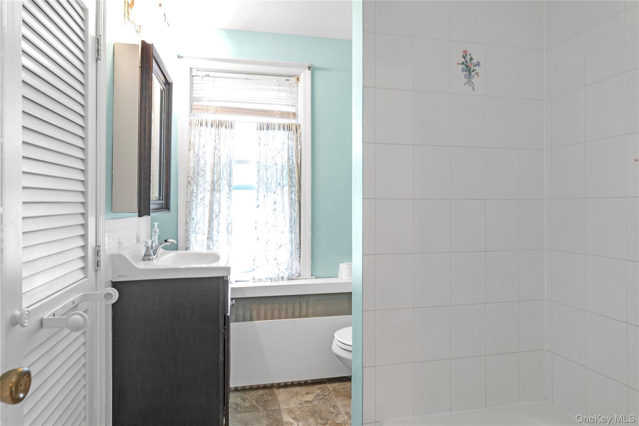 24 Walnut Street, Westbury, NY 11590