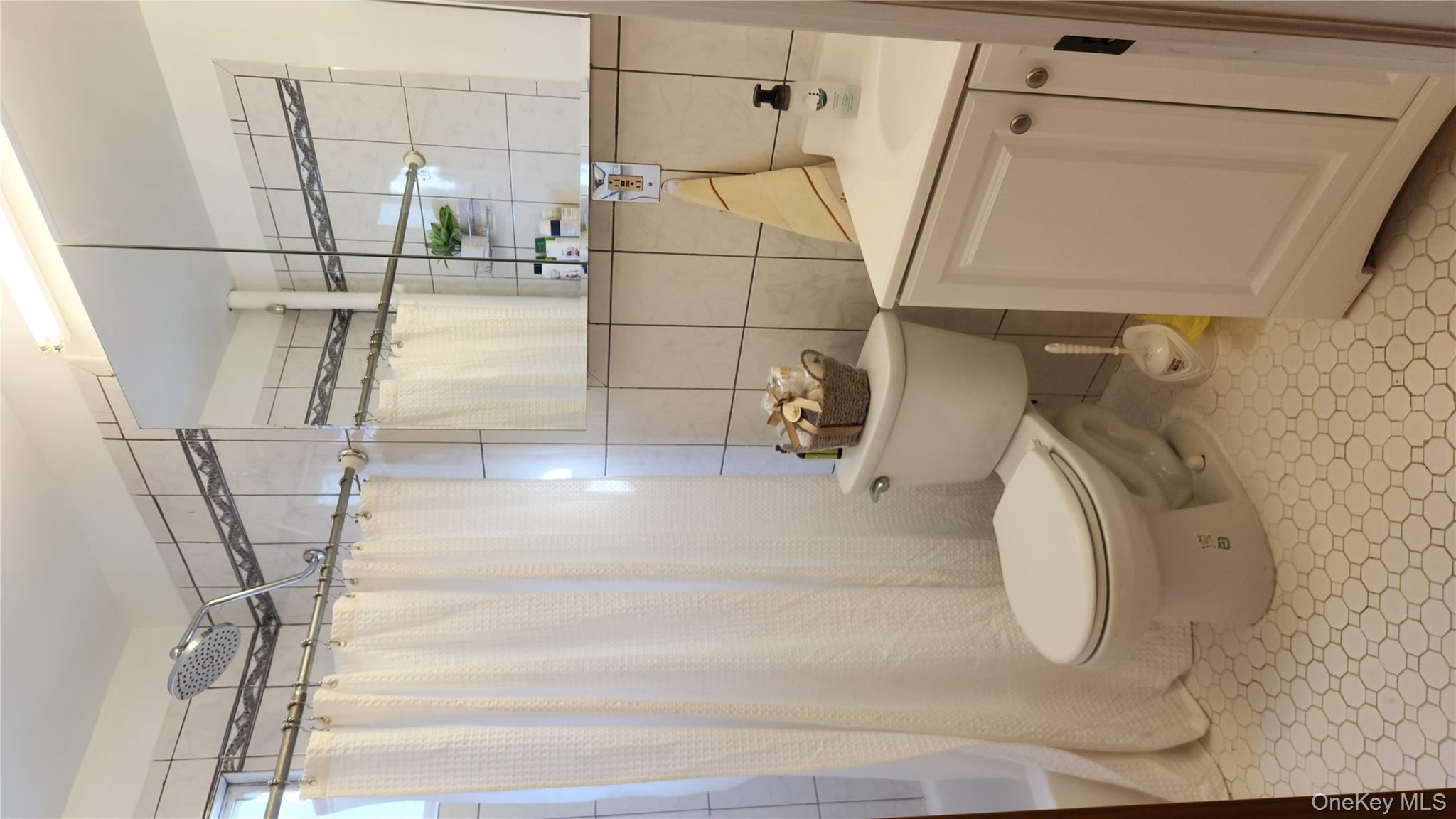 58-57 41st Drive, Woodside, NY 11377