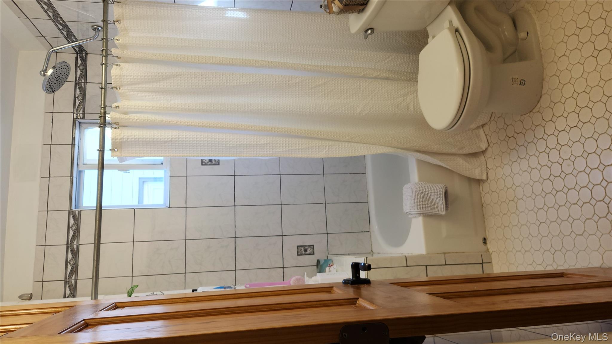 58-57 41st Drive, Woodside, NY 11377