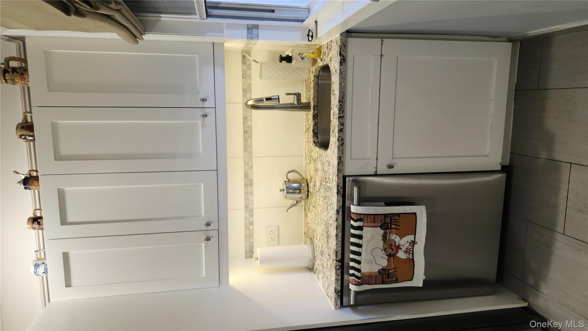 58-57 41st Drive, Woodside, NY 11377