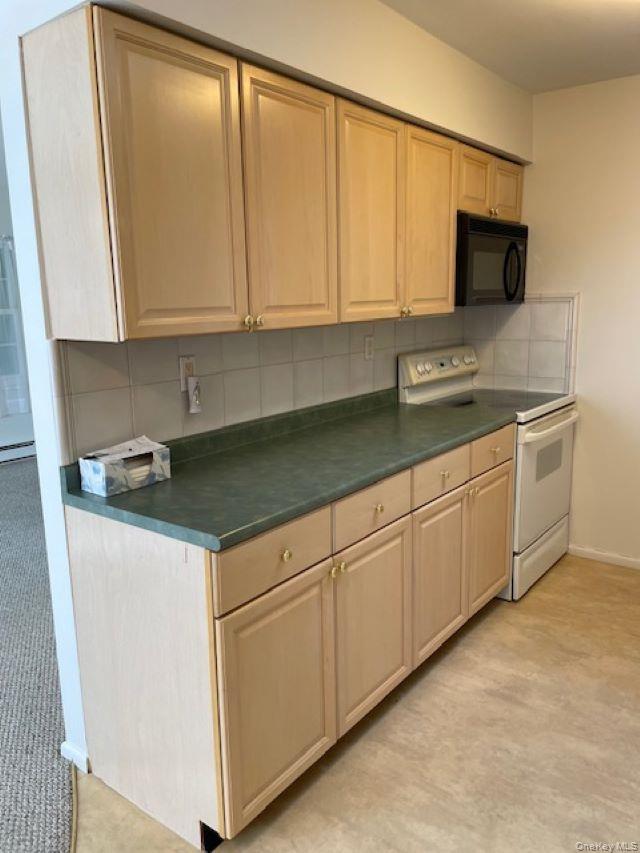 120 Exmore Court # D, Ridge, NY 11961