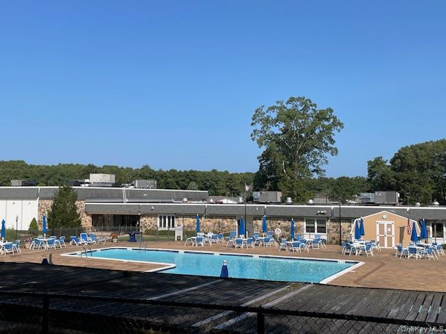 120 Exmore Court # D, Ridge, NY 11961