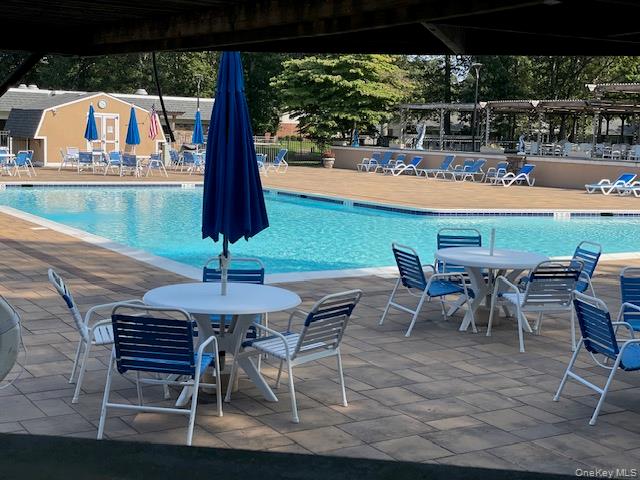 120 Exmore Court # D, Ridge, NY 11961