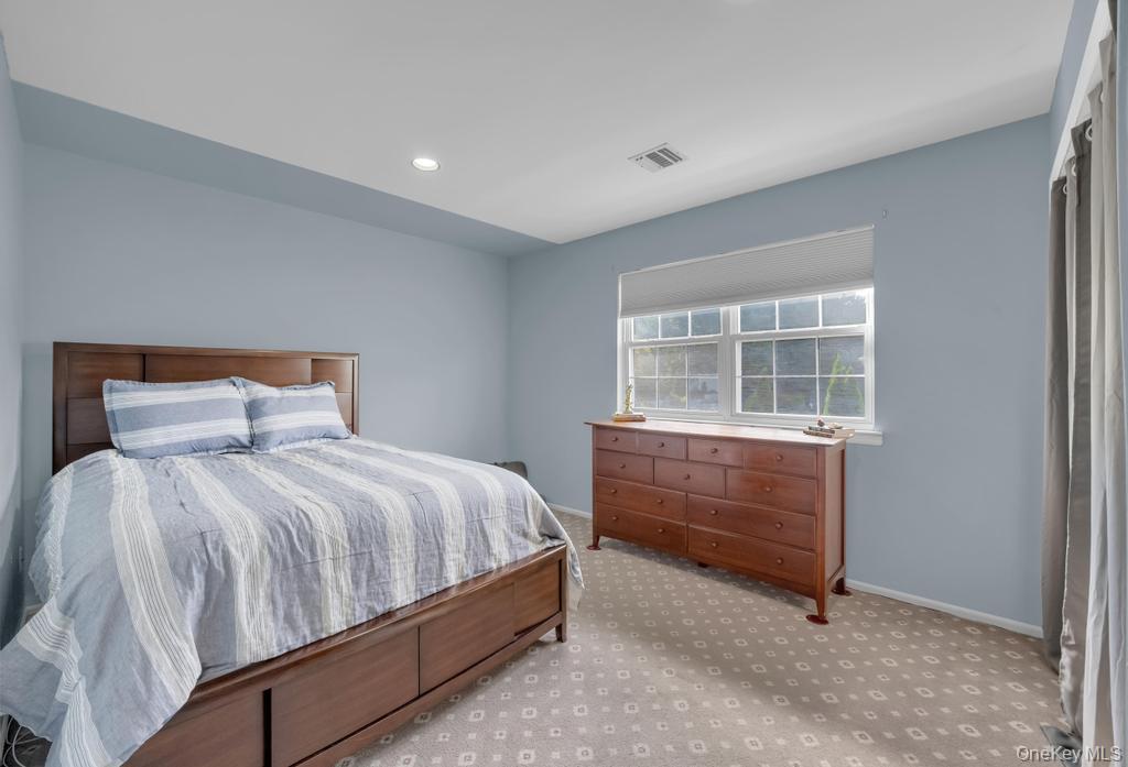 22 Whispering Woods Drive, Smithtown, NY 11787