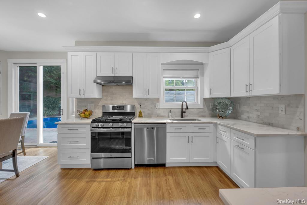 22 Whispering Woods Drive, Smithtown, NY 11787