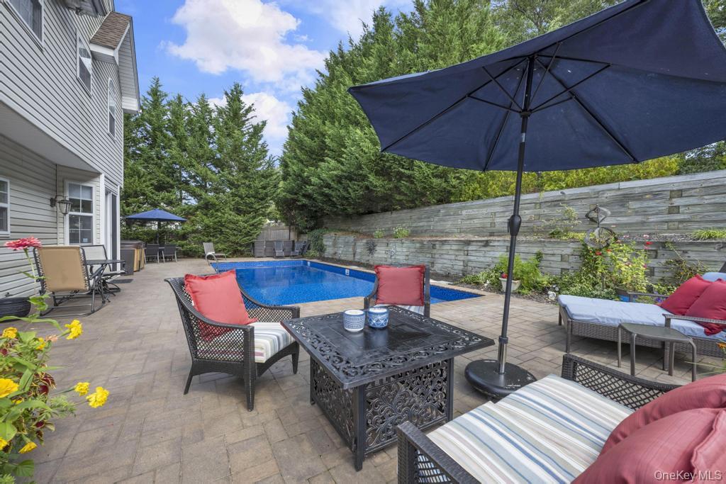 22 Whispering Woods Drive, Smithtown, NY 11787