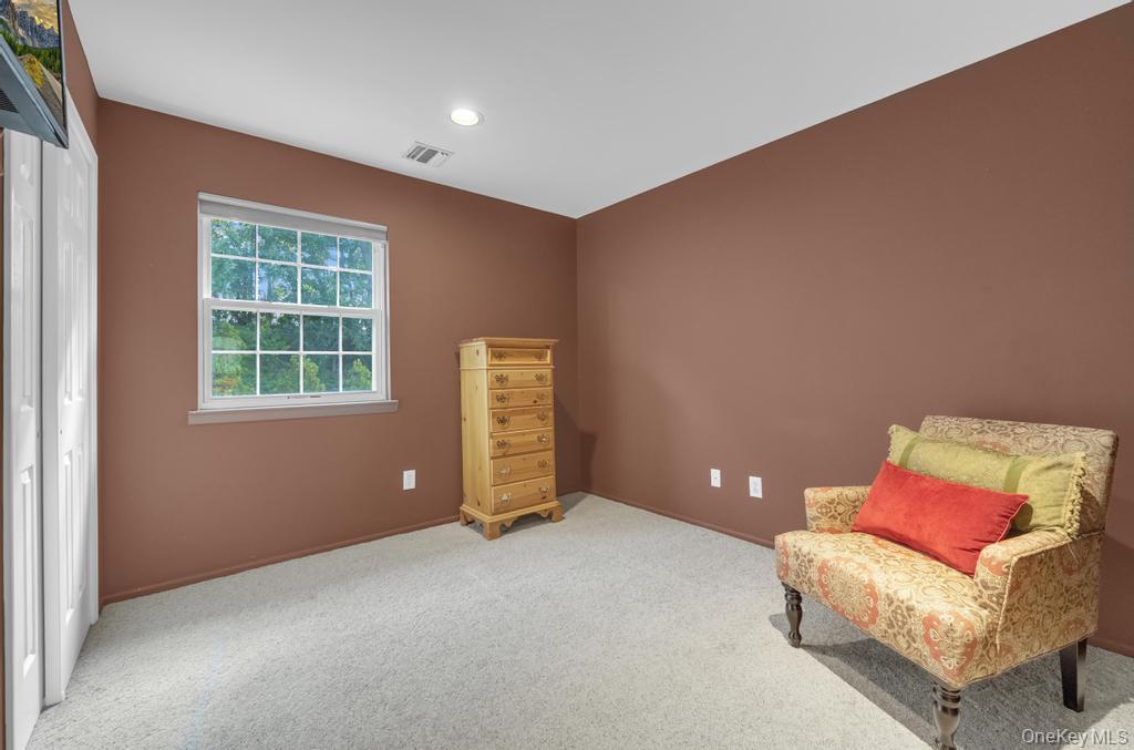 22 Whispering Woods Drive, Smithtown, NY 11787