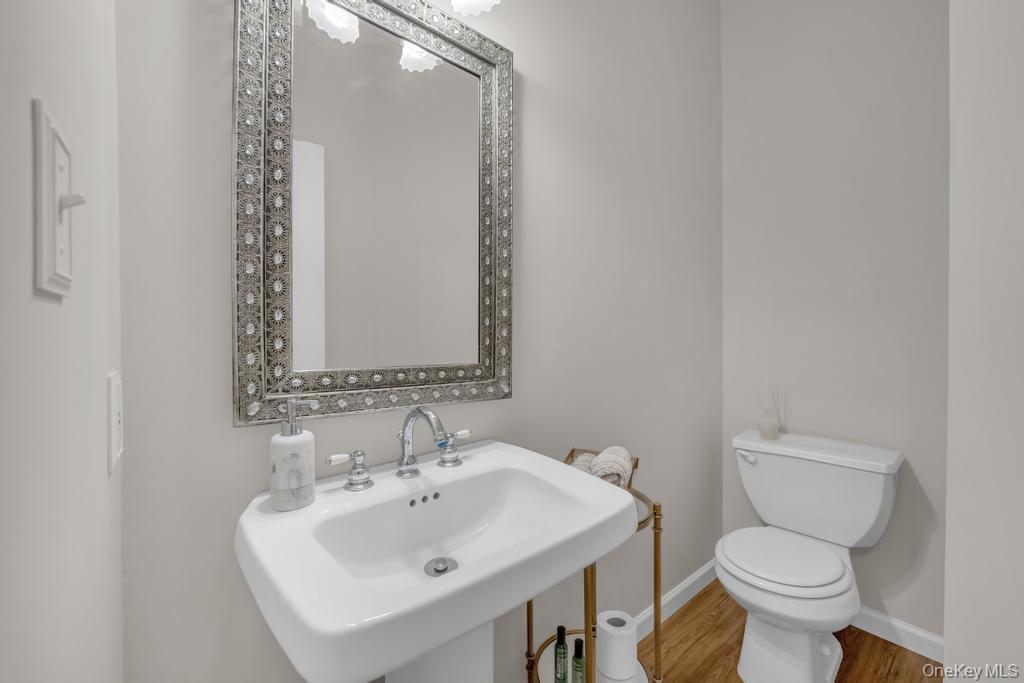 22 Whispering Woods Drive, Smithtown, NY 11787