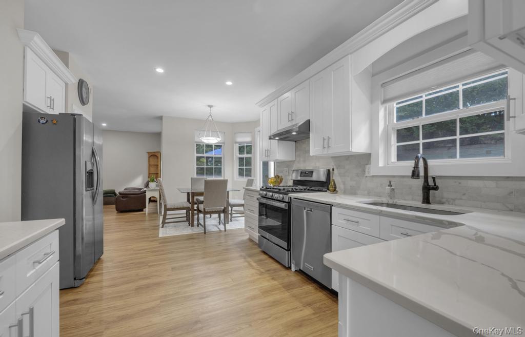 22 Whispering Woods Drive, Smithtown, NY 11787