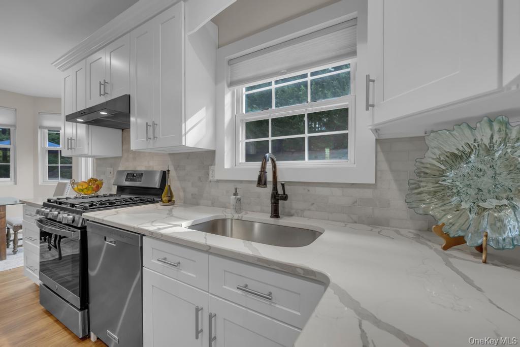 22 Whispering Woods Drive, Smithtown, NY 11787