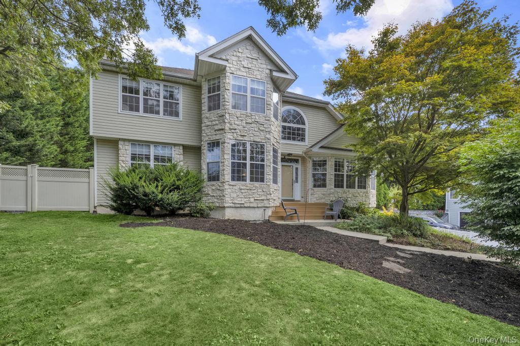 22 Whispering Woods Drive, Smithtown, NY 11787