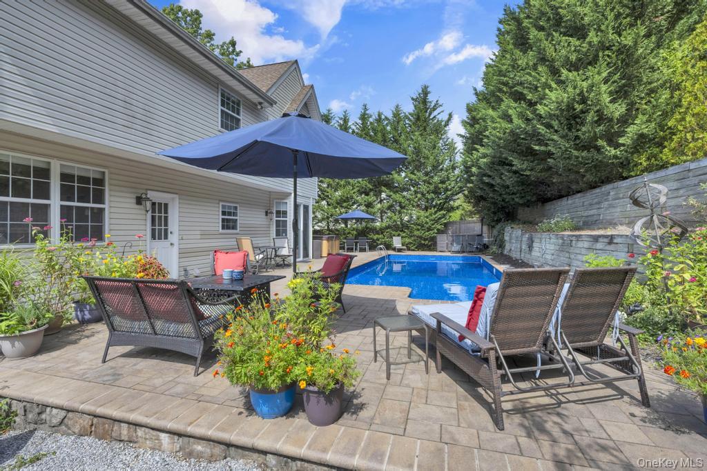 22 Whispering Woods Drive, Smithtown, NY 11787