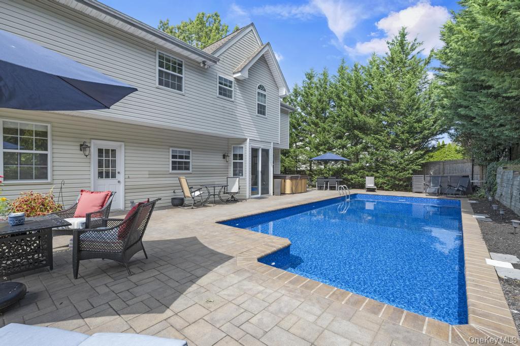 22 Whispering Woods Drive, Smithtown, NY 11787