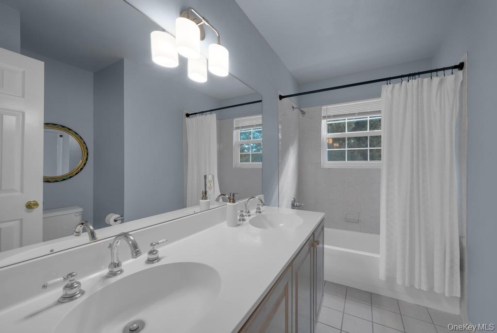 22 Whispering Woods Drive, Smithtown, NY 11787