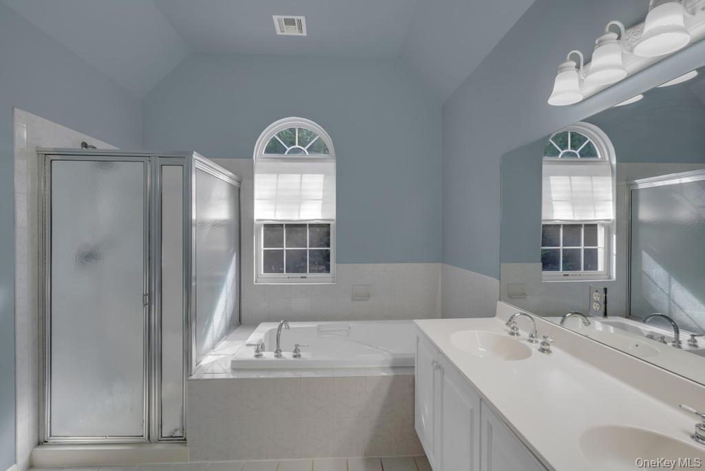 22 Whispering Woods Drive, Smithtown, NY 11787