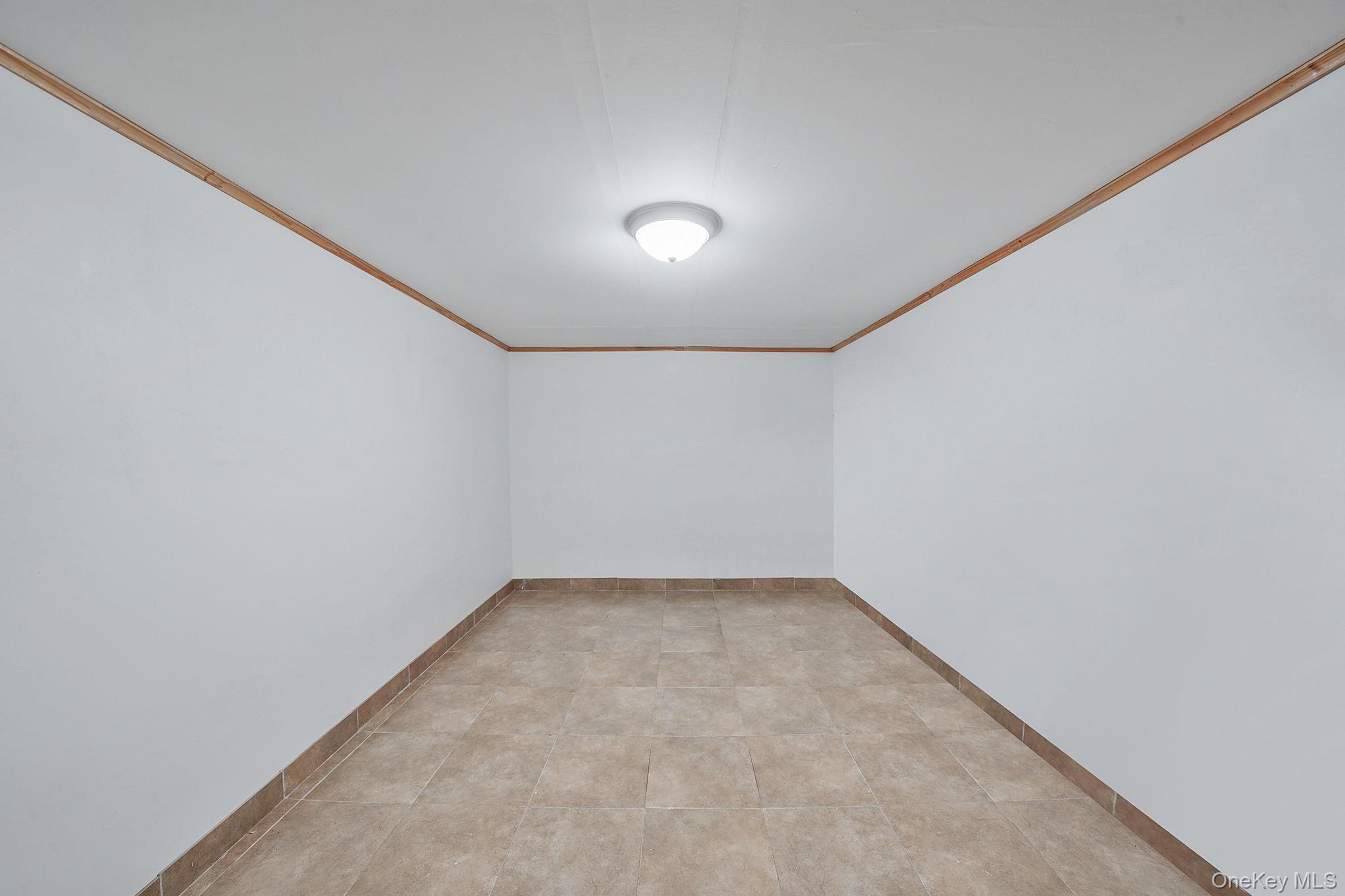 64-39 83rd Street, Middle Village, NY 11379