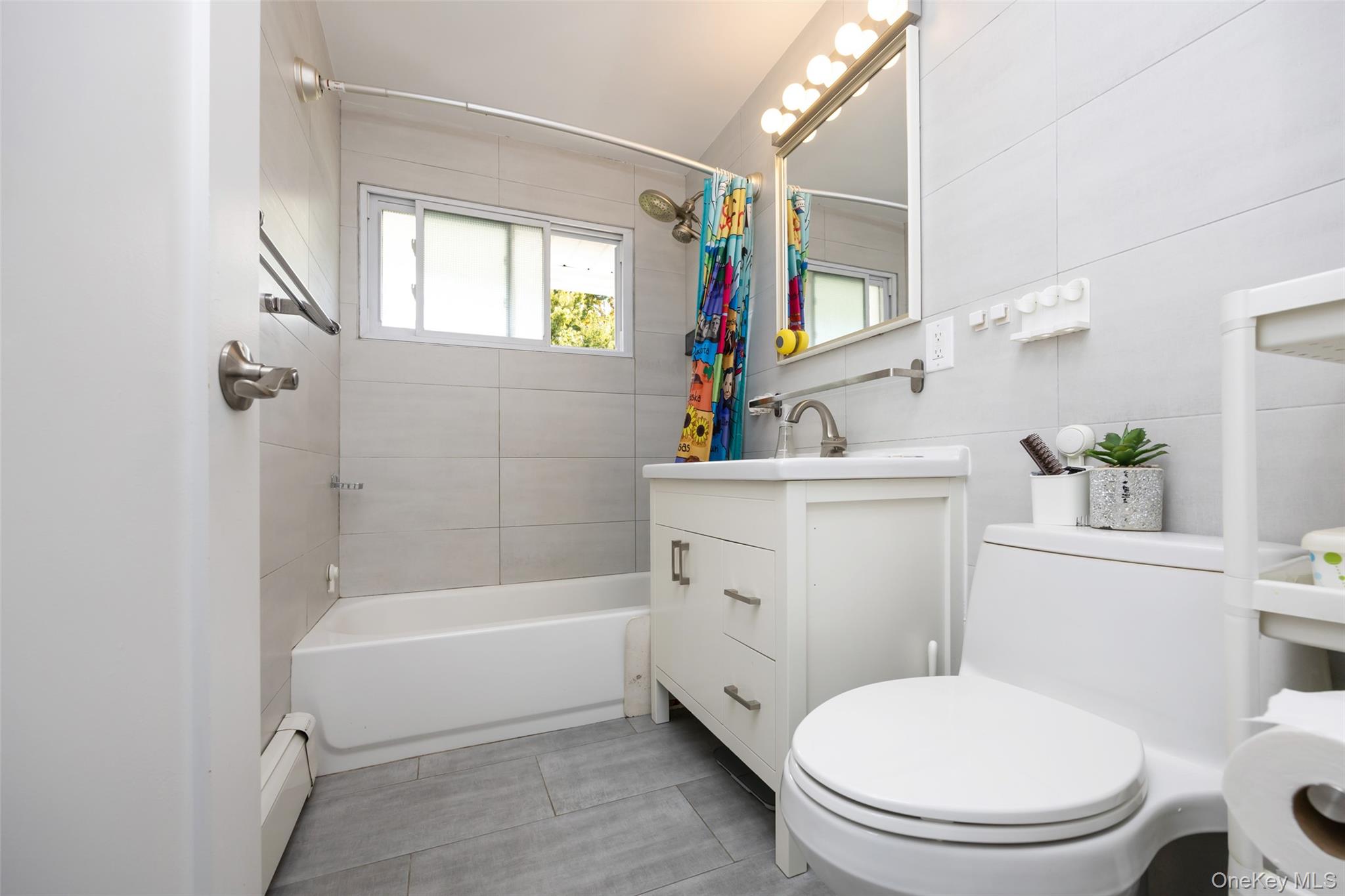 80 Cypress Lane E, Westbury, NY 11590