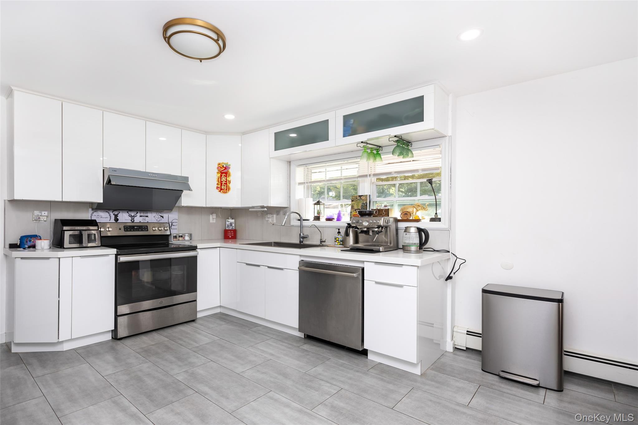 80 Cypress Lane E, Westbury, NY 11590