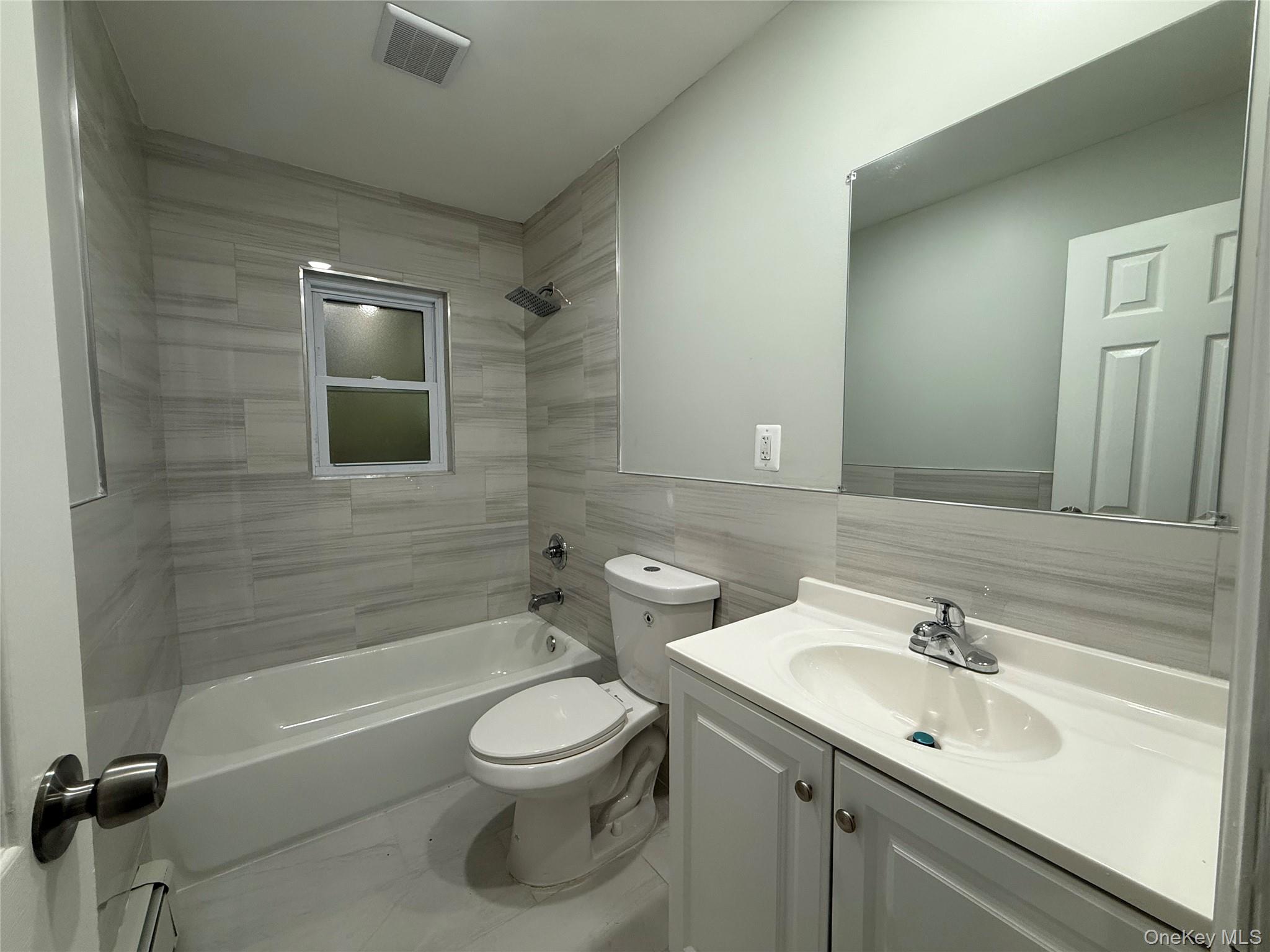 9 Holt Street, Amityville, NY 11701