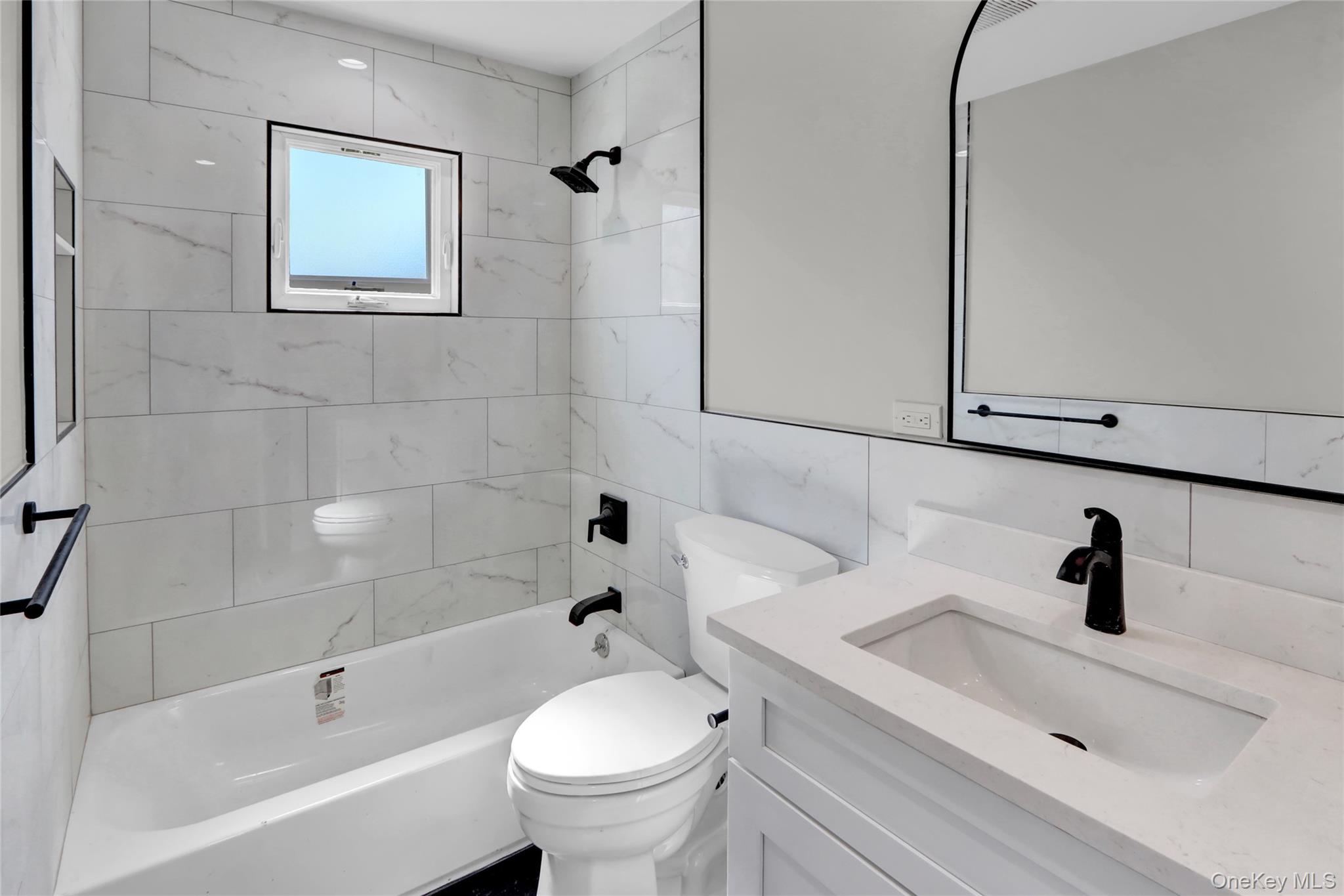 77 Carlls Path, North Babylon, NY 11703